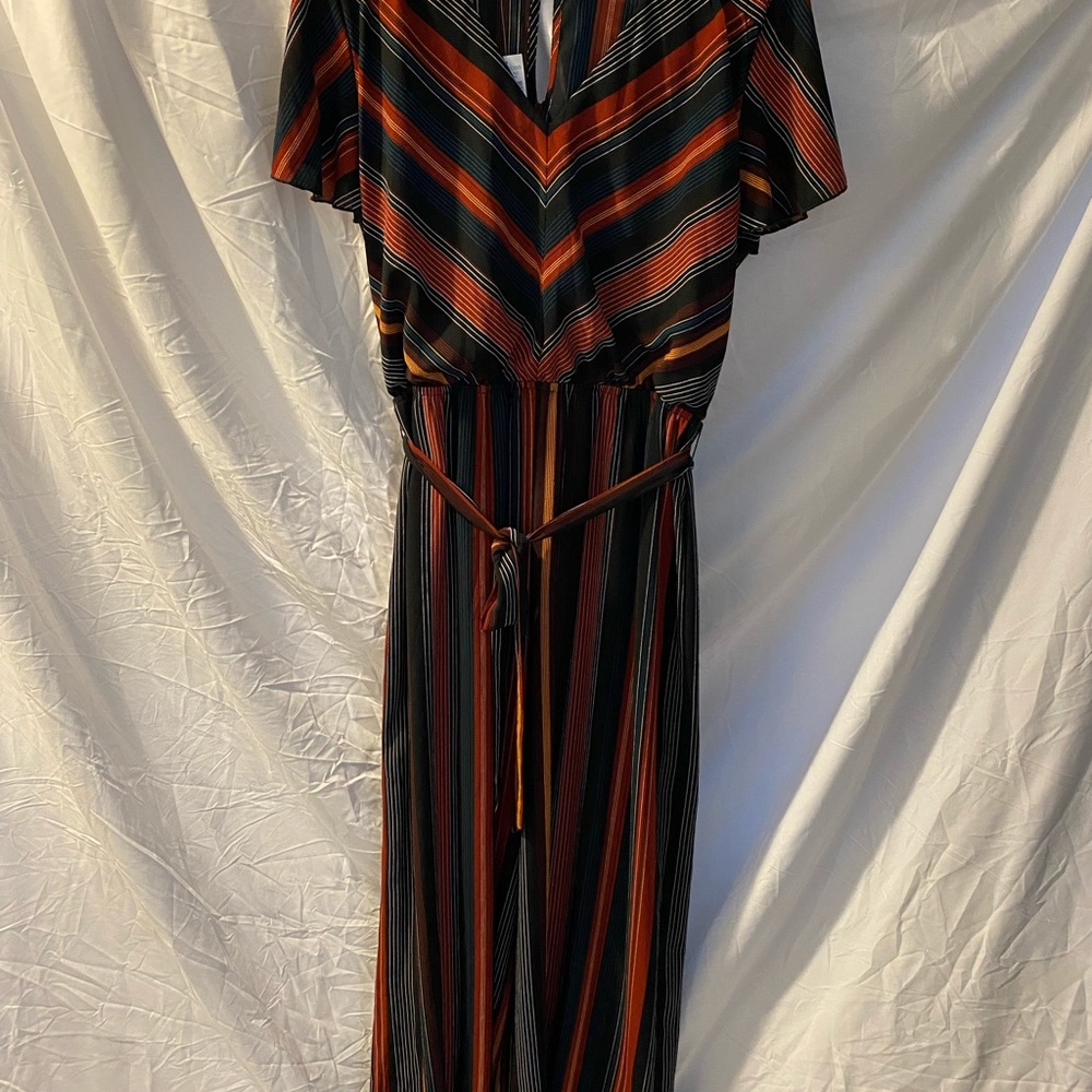 Never worn jumpsuit.
